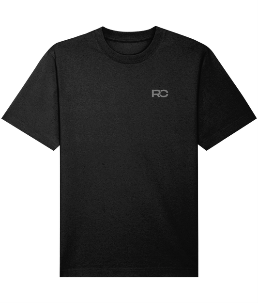 black oversized rave essentials t-shirt with tonal grey back print, front view
